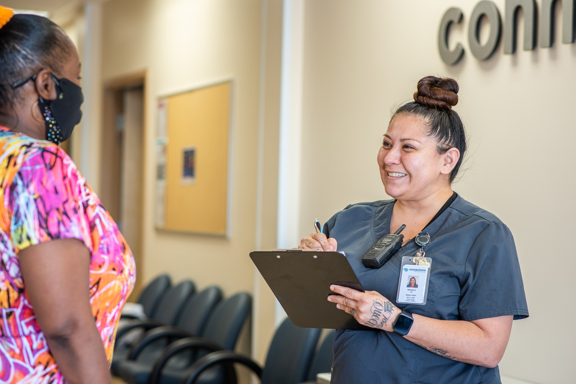 a happy staff member interacting a providing high-quality care